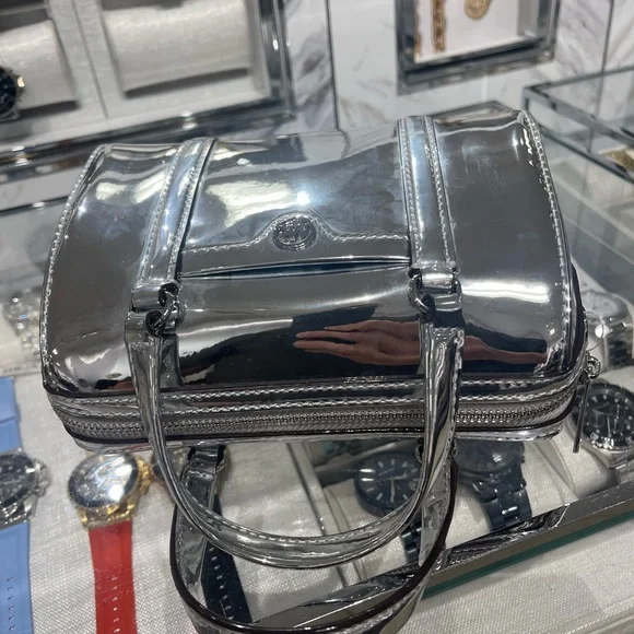 MICHAEL KORS Jet Set Small Patent Duffel Xbody Crossbody Bag
Silver 
NWT - Picture 10 of 16